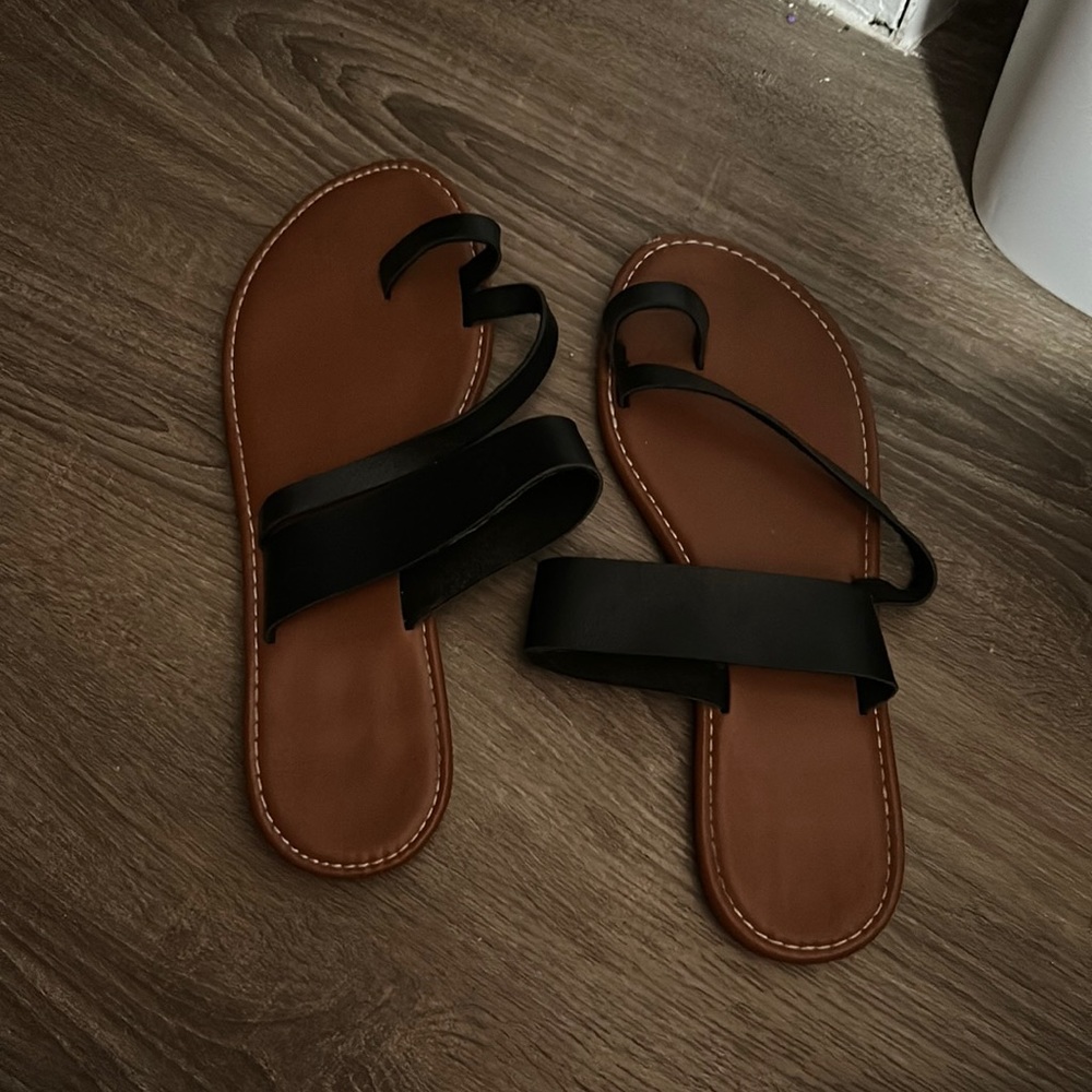 Black sandals.